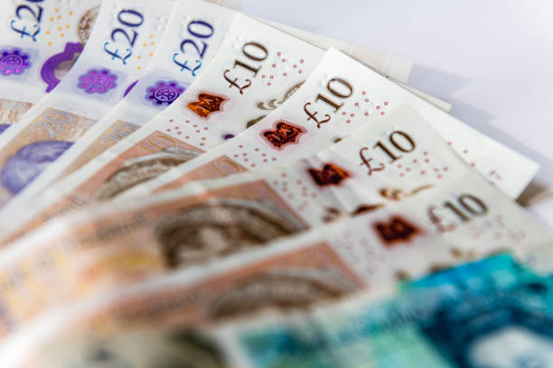 money notes in 20, 10 and 5 pound notes